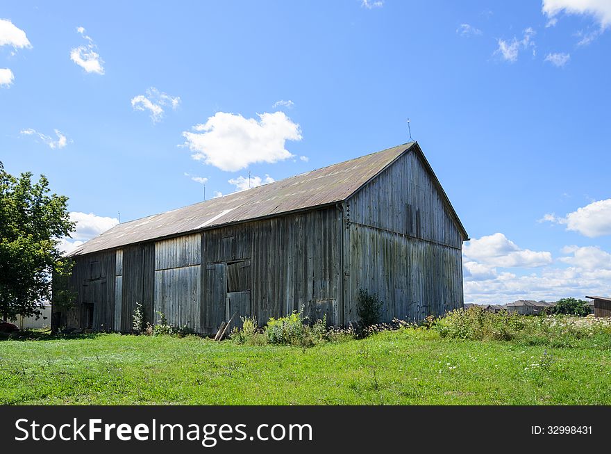 Traditional barn under blue sky