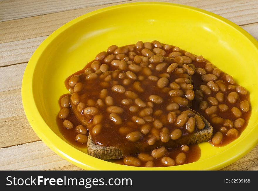 Baked beans on piece of toast. Baked beans on piece of toast.