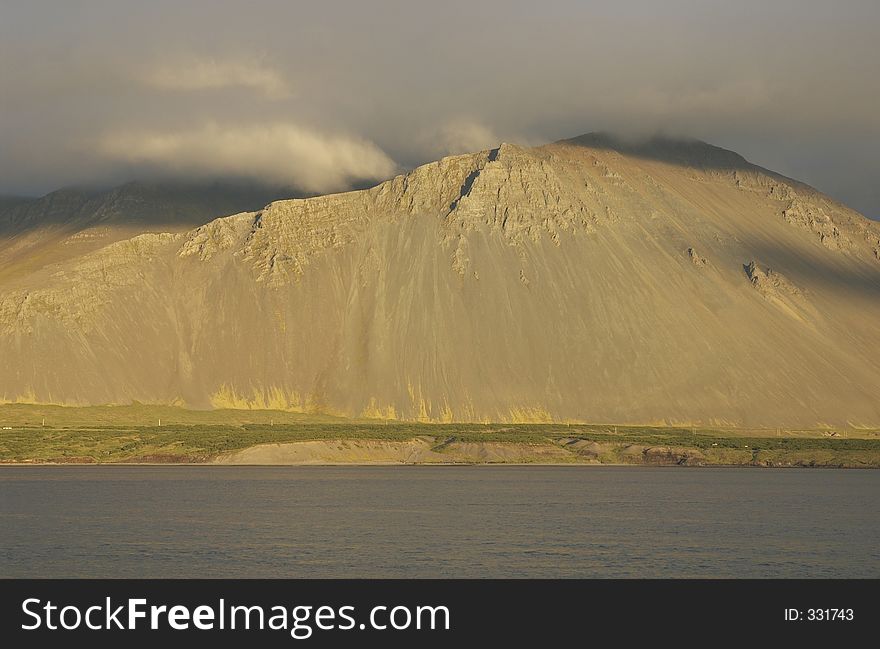 View of mountains in sunset light from Borgarnes, Iceland. View of mountains in sunset light from Borgarnes, Iceland