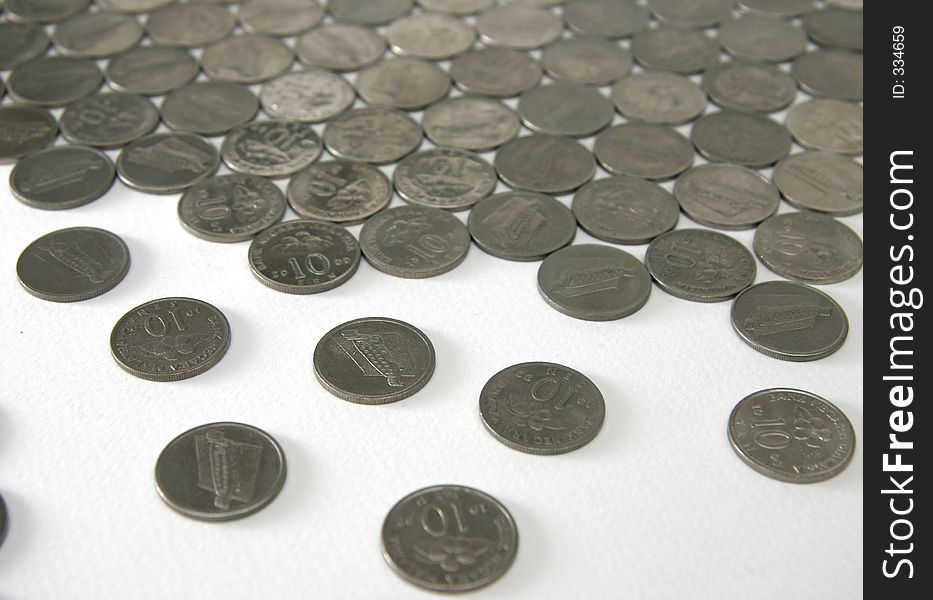 Floor of coins breaking up to individuals