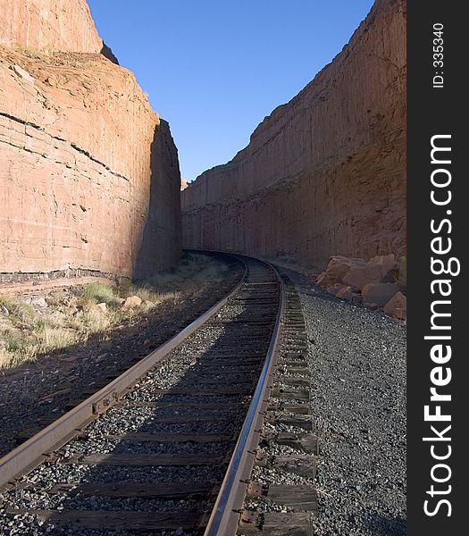 An unsympathetic landscape yields to the railroad near Moab, Utah. An unsympathetic landscape yields to the railroad near Moab, Utah