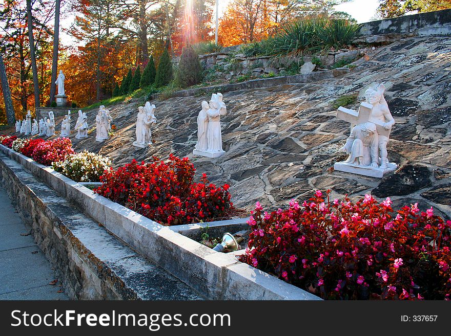 Statues on a garden hillside. Statues on a garden hillside.