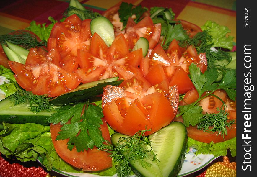 Salad from tomatoes and cucumbers. Salad from tomatoes and cucumbers