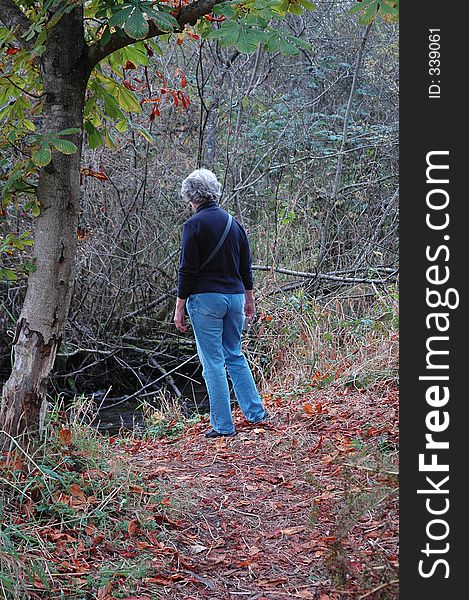 Woman on a walking trail. Woman on a walking trail