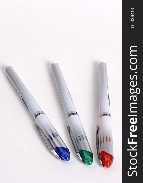 Three colorful pens. Three colorful pens