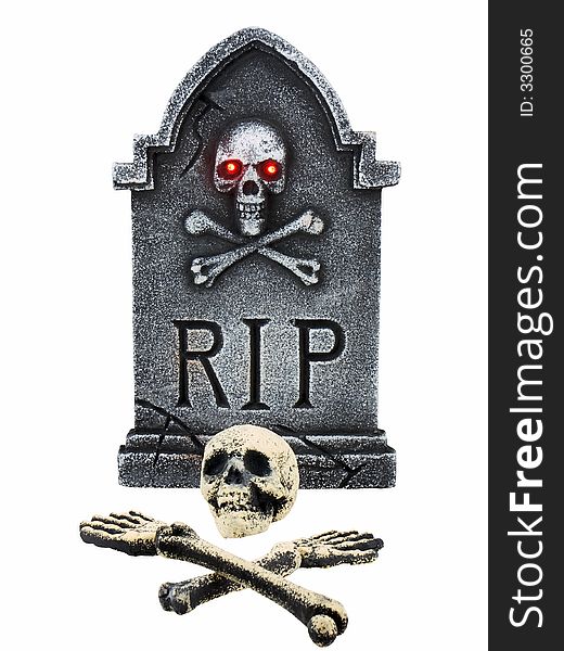 Tombstone and skeleton bones isolated on a white background. Tombstone and skeleton bones isolated on a white background