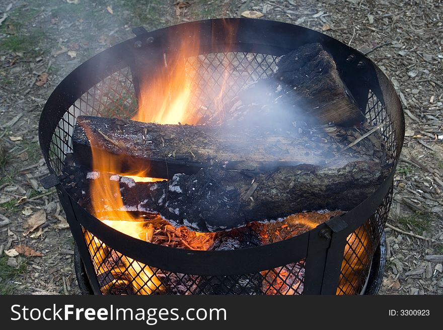 Burning wood in a barbacue. Burning wood in a barbacue