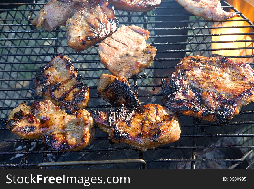 Close up of meat on a grill. Close up of meat on a grill