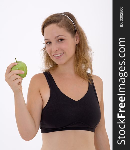 Fitness girl with apple, isolated