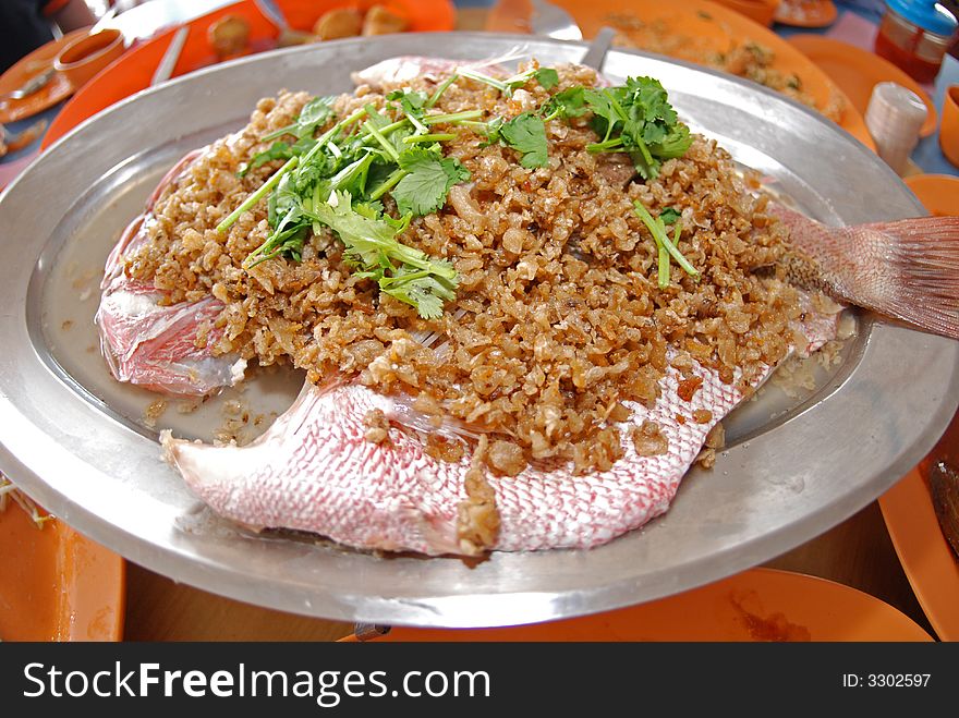 Cooked fish on the plates