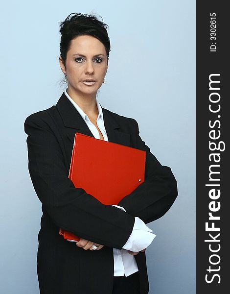 Business woman holding a red file