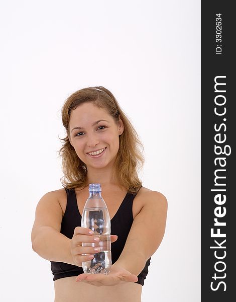 Fitness girl holding a bottle of water. Fitness girl holding a bottle of water