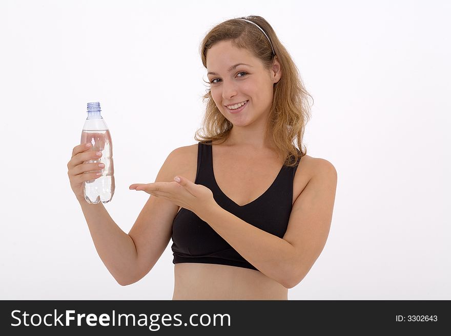 Fitness girl holding a bottle of water. Fitness girl holding a bottle of water