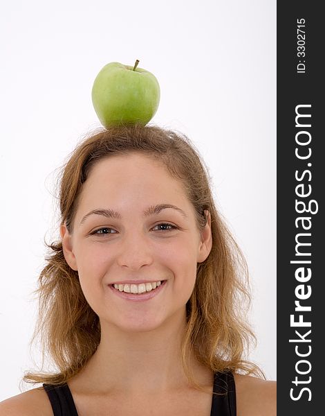 Fitness girl with apple, isolated