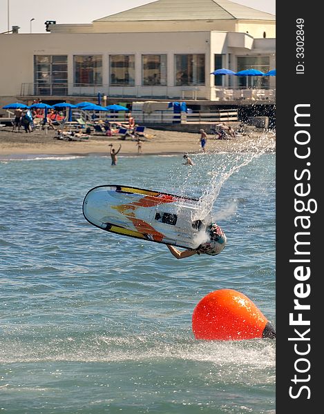 A jetskier jump during a freestyle competition. A jetskier jump during a freestyle competition