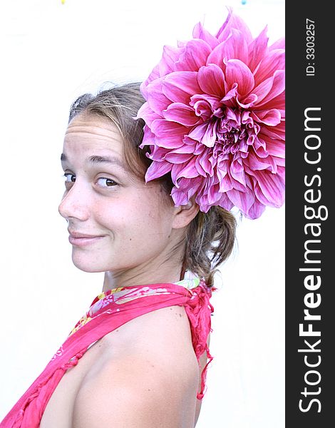 Young woman with flower in hair