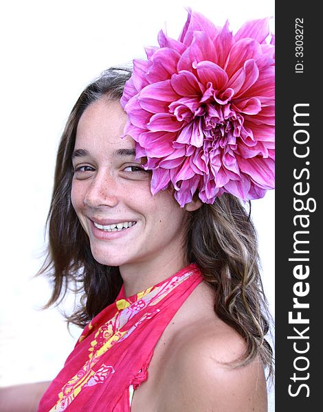 Young woman with flower in hair