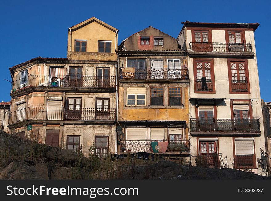 Old houses in Porto (portugal) Ribeira suburb (city center & old part of town). Old houses in Porto (portugal) Ribeira suburb (city center & old part of town).