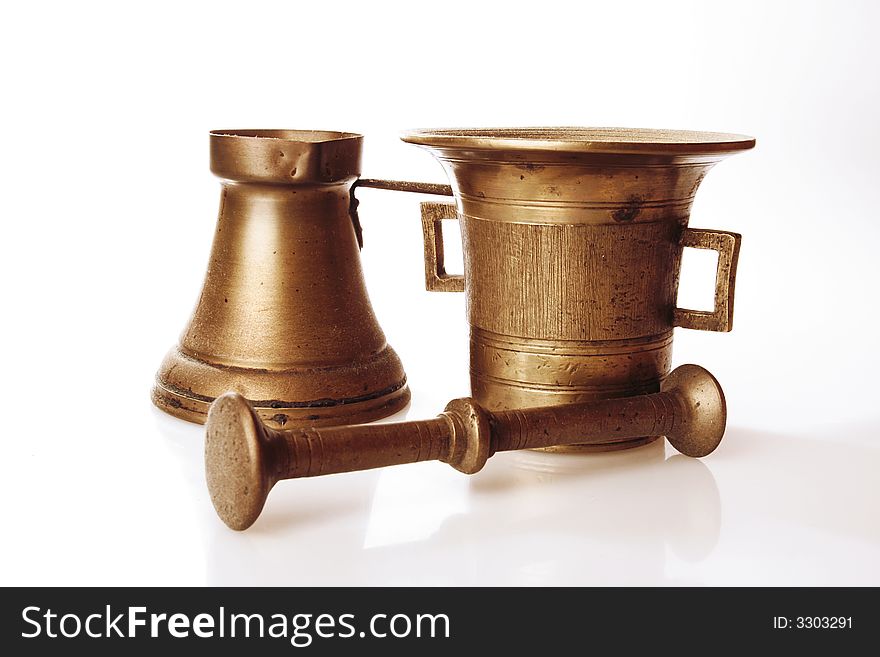 Old Turkish brass coffee brewer and mortar. Old Turkish brass coffee brewer and mortar