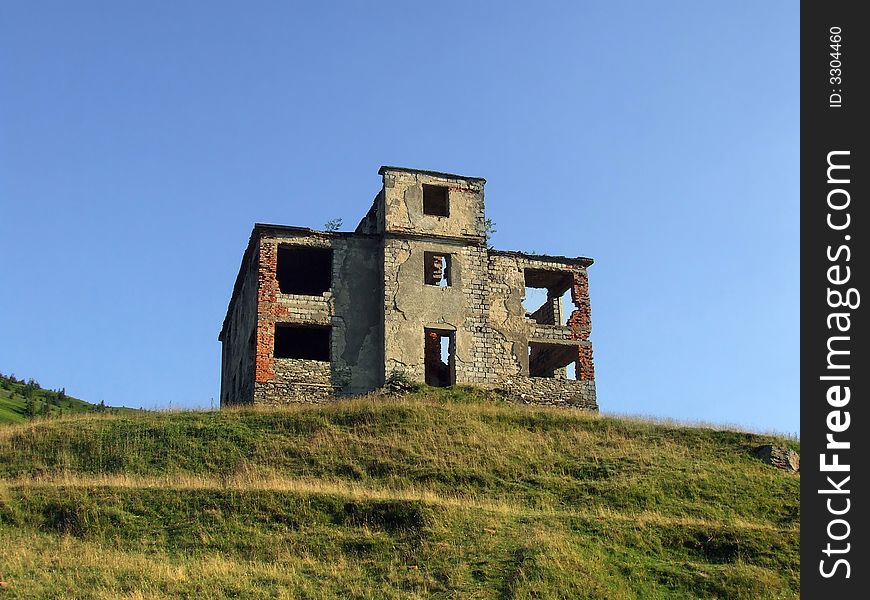 Old and abandoned house stands on the hill