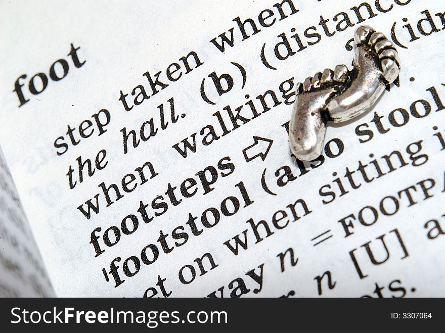 The word footstepsin close-up next to a little foots.