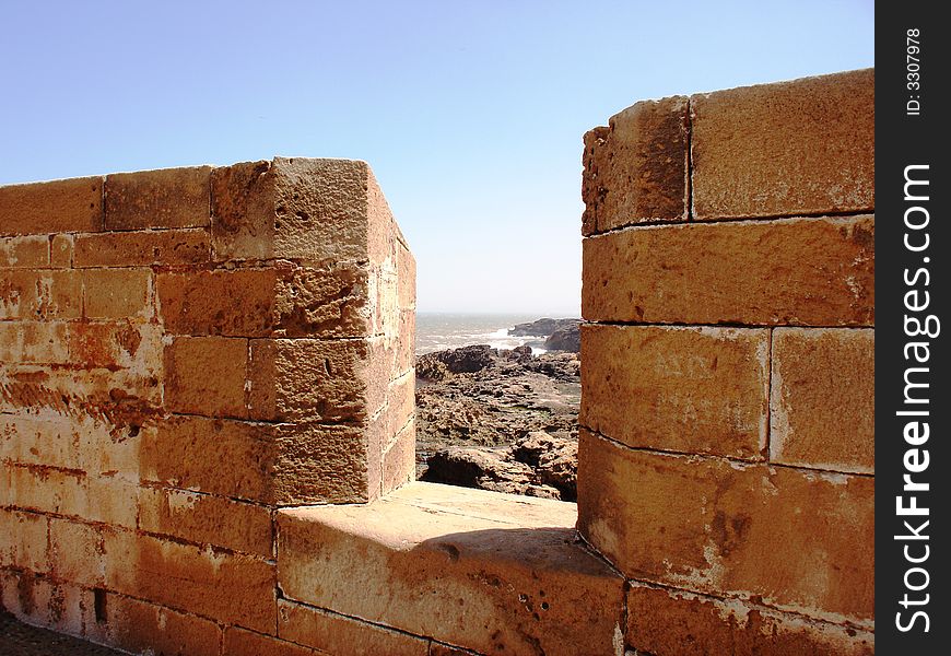 Viewing the seas from the wall of the fort in El Jadida, Morocco. Viewing the seas from the wall of the fort in El Jadida, Morocco.