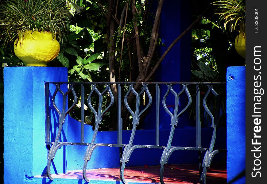 Wrought-iron handrails in the shape of tulips is one of many architectural details found in the Majorelle gardens. Wrought-iron handrails in the shape of tulips is one of many architectural details found in the Majorelle gardens.