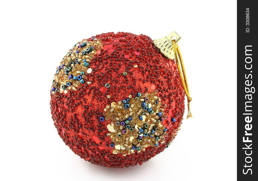 Red christmas decoration strewed by beads