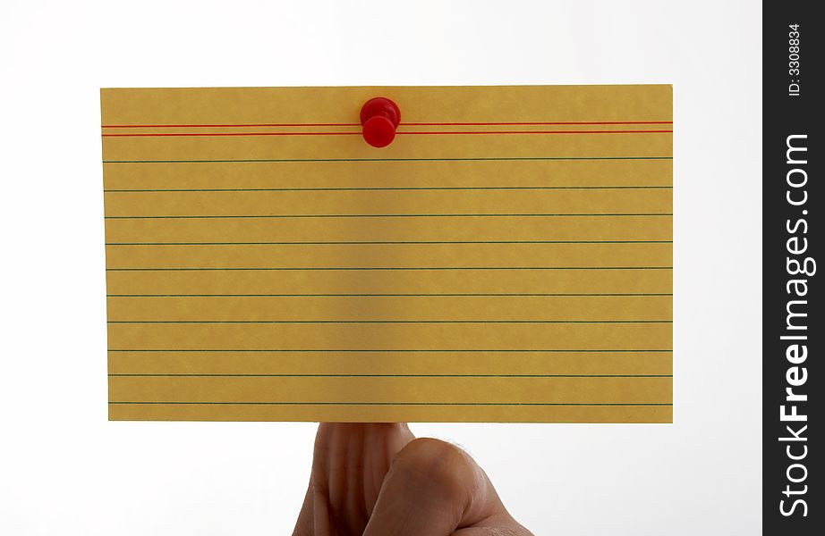 A blank card pinned on a hand