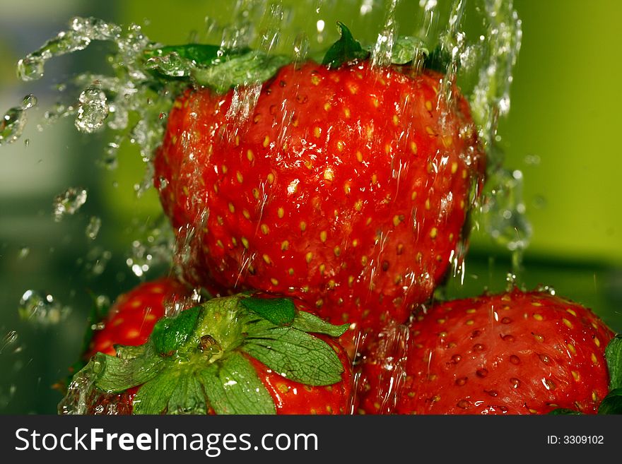 Strawberry fruit in the clean water. Strawberry fruit in the clean water