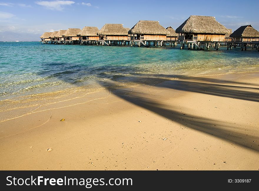 Tropical lagoon with over the water bungalow. Tropical lagoon with over the water bungalow