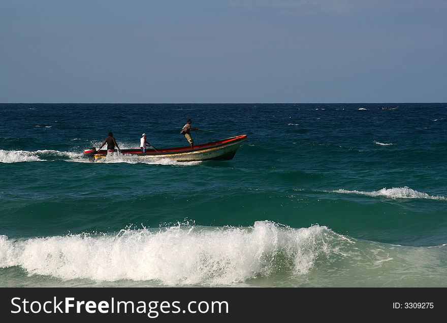 Tropical beach landscape, boat in the sea