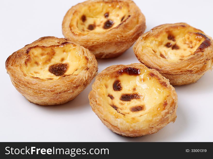 The egg tart or egg custard tart (commonly romanized as dan tat) is a kind of custard tart pastry found in Portugal, England, Hong Kong and other Asian countries, which consists of an outer pastry crust that is filled with egg custard and baked.