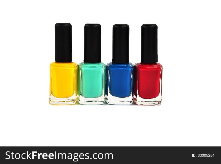 Four bright colors of nail polish. Four bright colors of nail polish