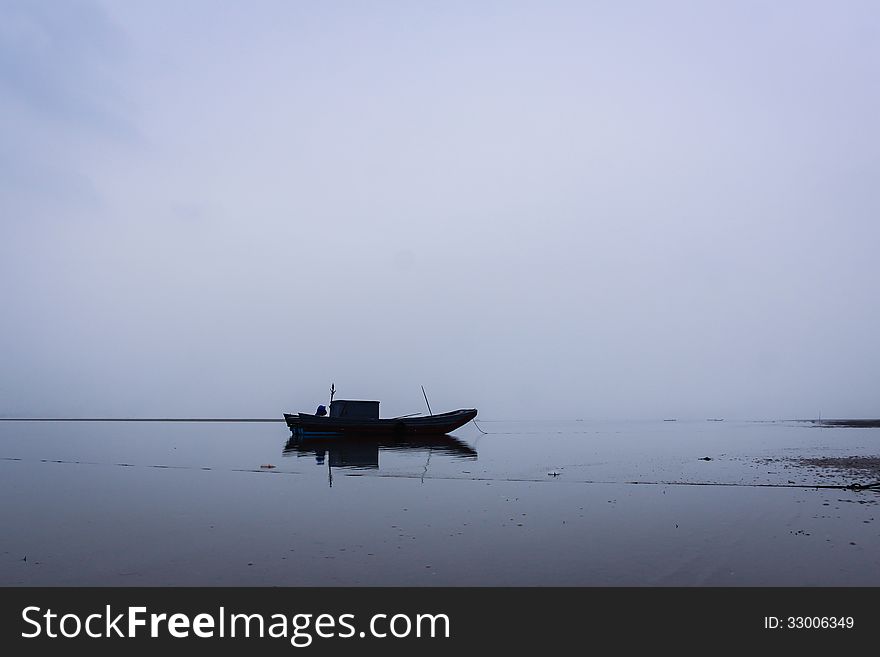Boat on the Tra Co beach, Quang Ninh province, north Vietnam. Boat on the Tra Co beach, Quang Ninh province, north Vietnam