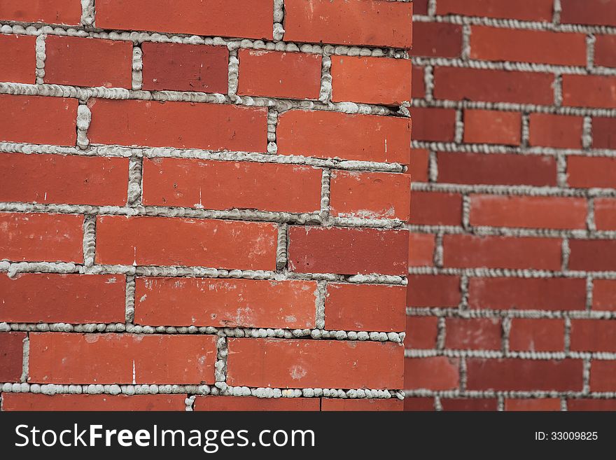 Wall from a red brick, close up. Wall from a red brick, close up.