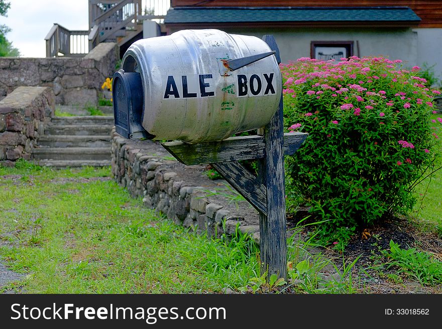 A unique and humorous mailbox made from converted beer keg. The picture was taken at Barley Creek Brewing Company, Tannersville PA. A unique and humorous mailbox made from converted beer keg. The picture was taken at Barley Creek Brewing Company, Tannersville PA.