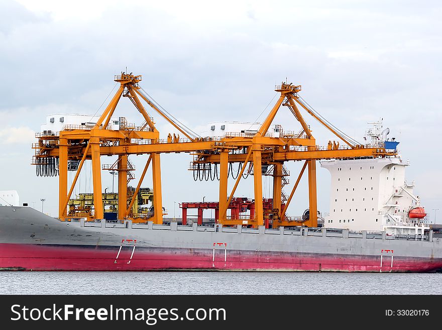 Cranes and ship on the loading port