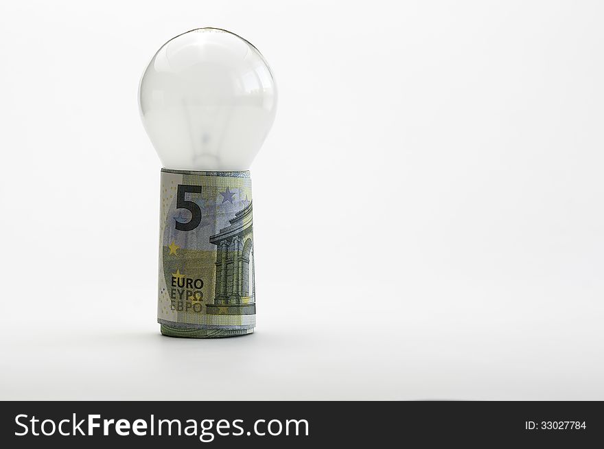 Bulb wrapped up with money save energy. Bulb wrapped up with money save energy