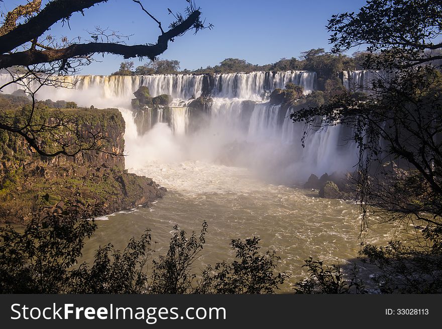 The Iguazu Falls, IguazÃº Falls, Iguassu Falls or IguaÃ§u Falls, on the Iguazu River at the boundary between Argentina and Brazi, one of the most impactant waterfall in the world.