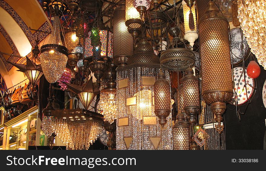 Bronze and crystal lamps in the eastern shop. Bronze and crystal lamps in the eastern shop