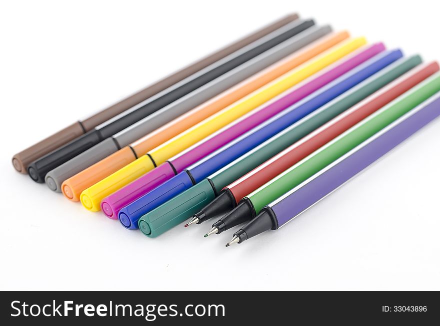 Colorful pens isolated on white background