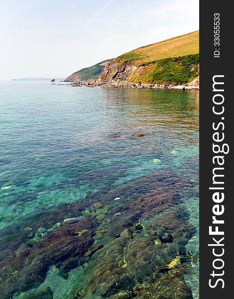 Clear sea in Cornwall England at Portwrinkle Whitsand bay