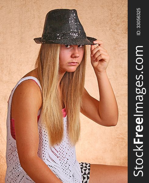 Teenage Female Tipping Black Hat. Teenage Female Tipping Black Hat