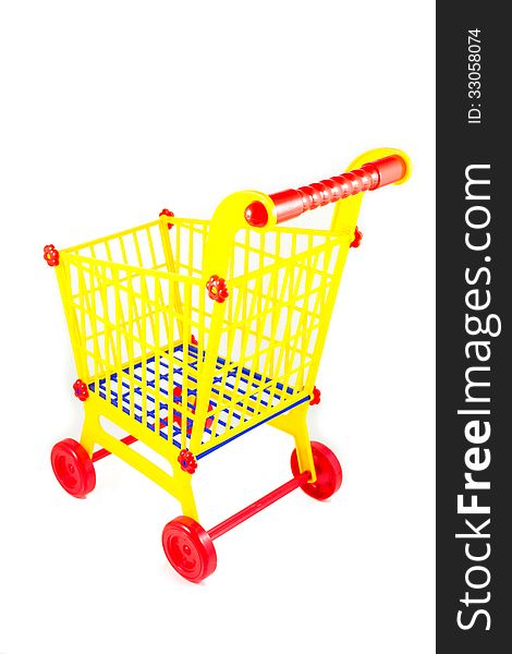 Plastic shopping cart is isolated on white