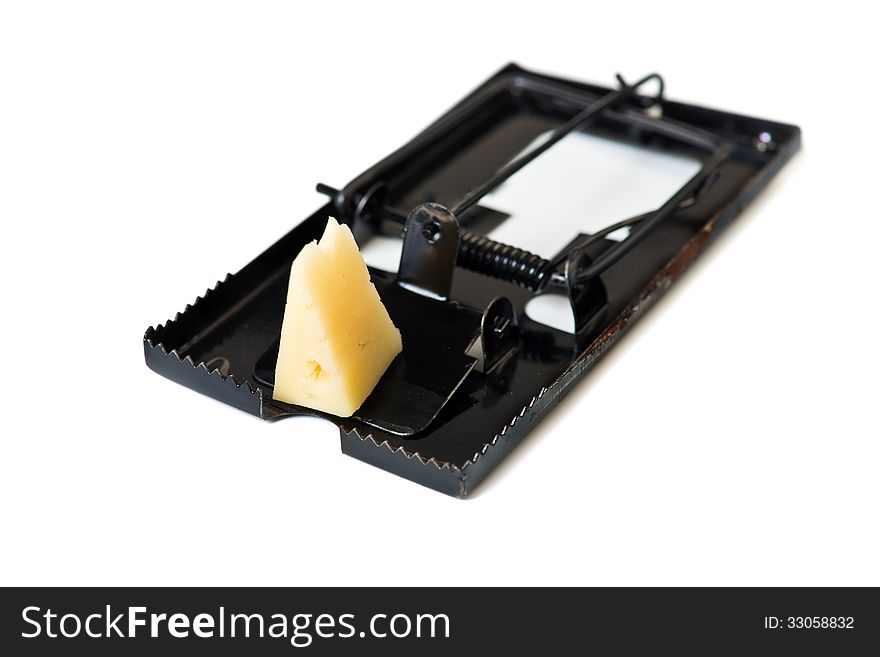 Metal mousetrap with cheese isolated over white