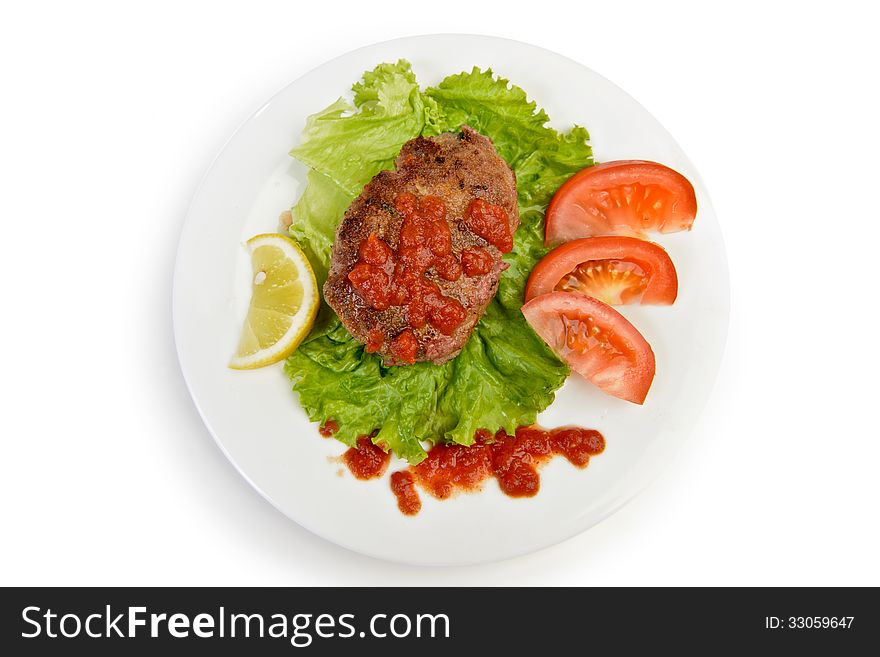 Rissole cutlet meatball at plate isolated with work path. Rissole cutlet meatball at plate isolated with work path