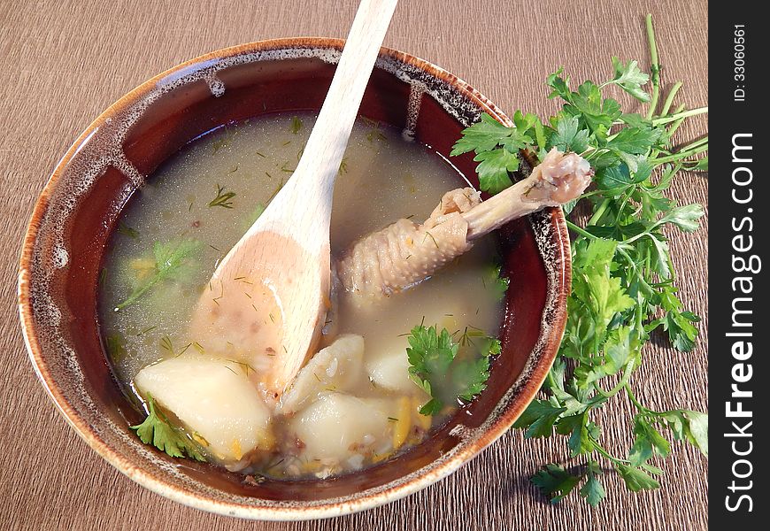 Buckwheat soup with chicken in a clay pot