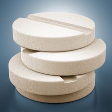 Four Tablets On Blue Background Stock Photo Four Tablets On Blue Background Stock Photo