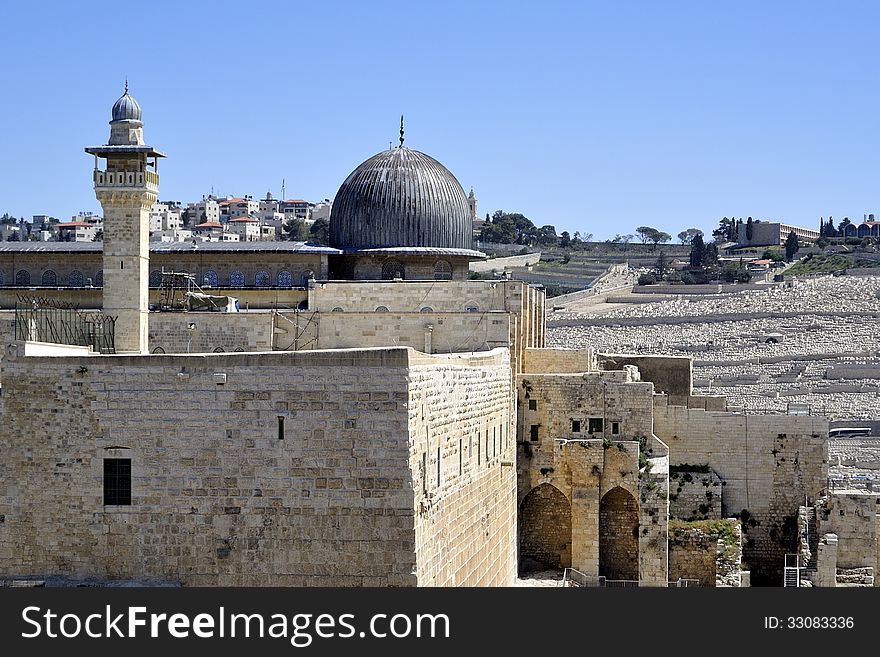 Al-Aqsa dome and minaret in Old City of Jerusalem. Al-Aqsa dome and minaret in Old City of Jerusalem.